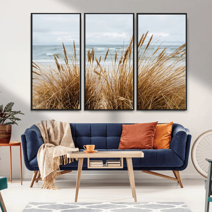 Canvas of golden beach grass swaying by the ocean under a soft cloudy sky, perfect for neutral-toned or coastal minimalist decor.