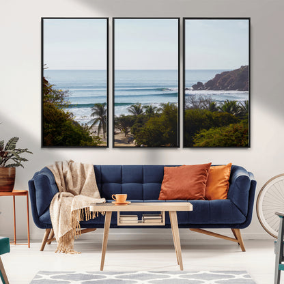 View of calm ocean waves with palm trees and a tropical coastline, ideal for coastal boho or beach-themed wall decor.