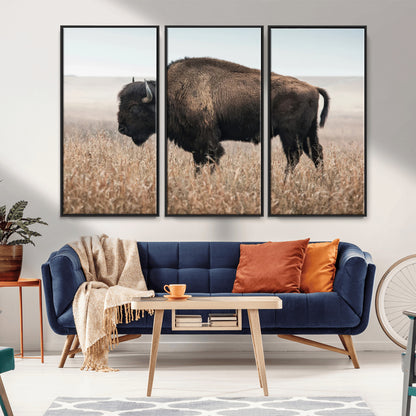 A lone bison stands in a vast prairie under a soft sky, evoking freedom and rustic charm for western or farmhouse inspired interiors.