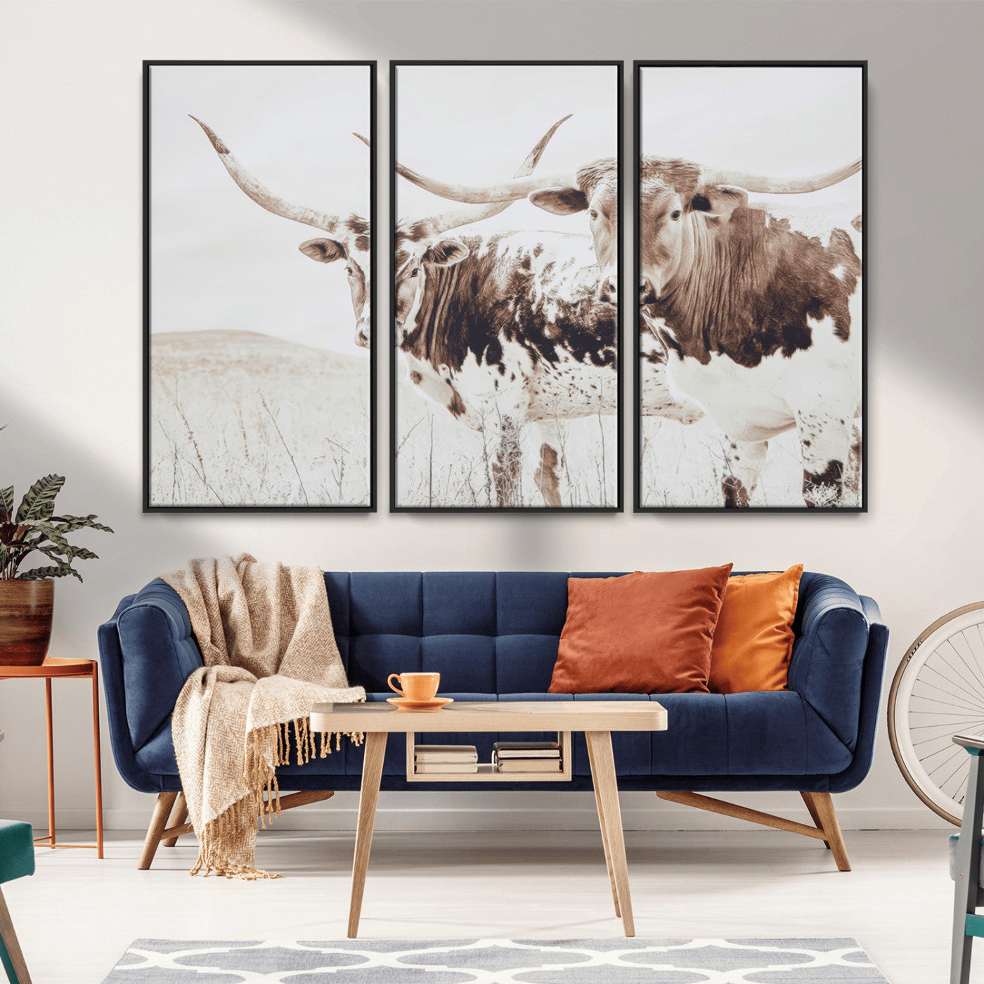 Two longhorn cows standing in a sepia-toned pasture with soft light, ideal for rustic or farmhouse-themed neutral wall decor.