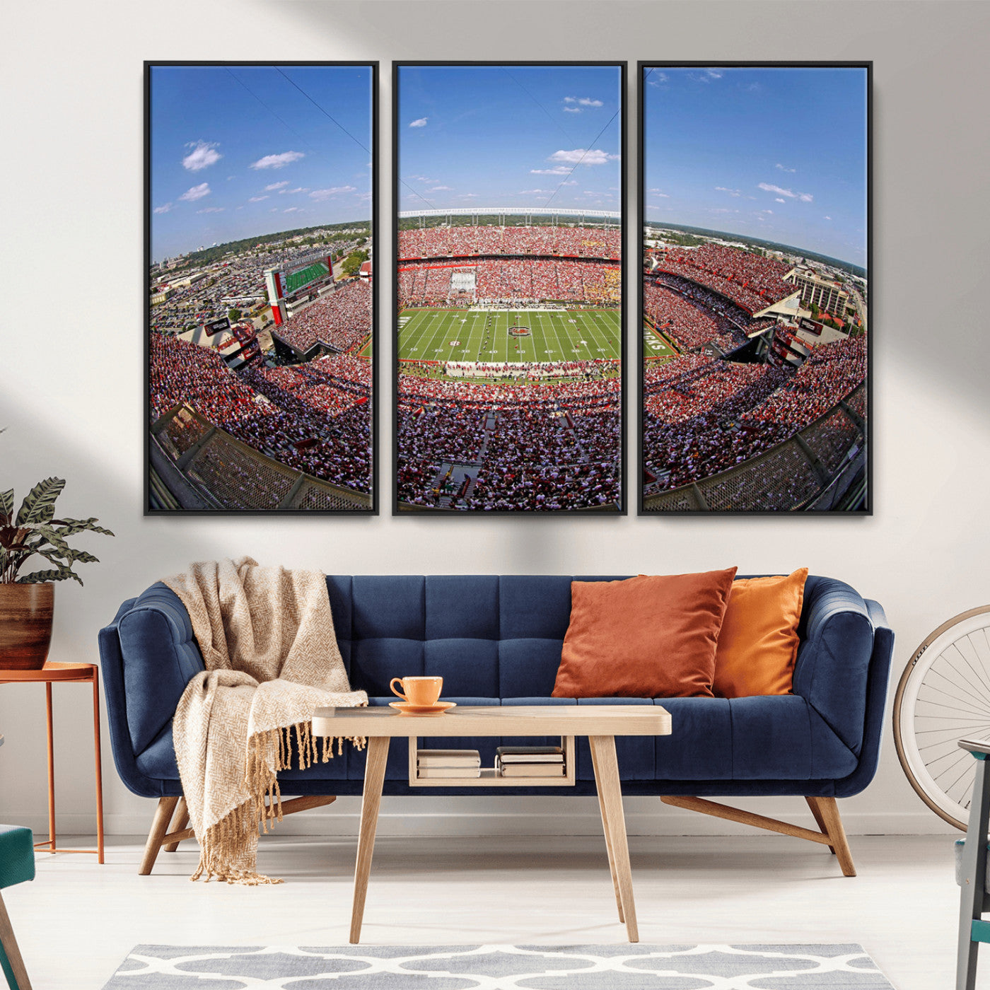 An William Brice-Stadium view of a full football stadium with cheering fans and clear blue skies, capturing the excitement and energy of the game.