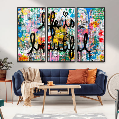 Colorful urban-style canvas with graffiti text “Life is Beautiful” in black paint, ideal for bold or street-themed home decor.