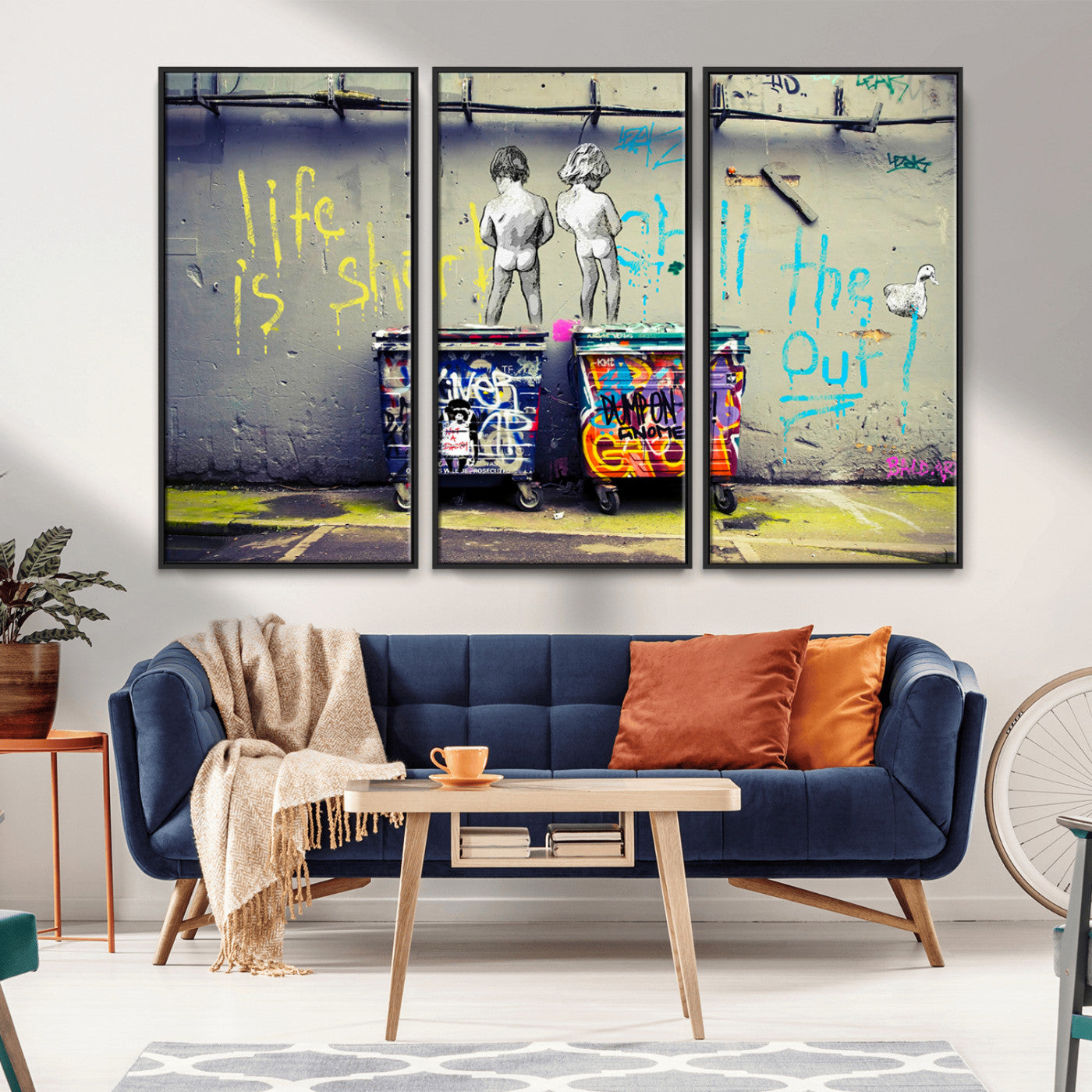 Graffiti-style canvas art with bold text and two naked figures over urban dumpsters, ideal for edgy or street-style decor.