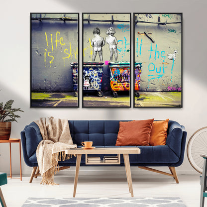 Graffiti-style canvas art with bold text and two naked figures over urban dumpsters, ideal for edgy or street-style decor.