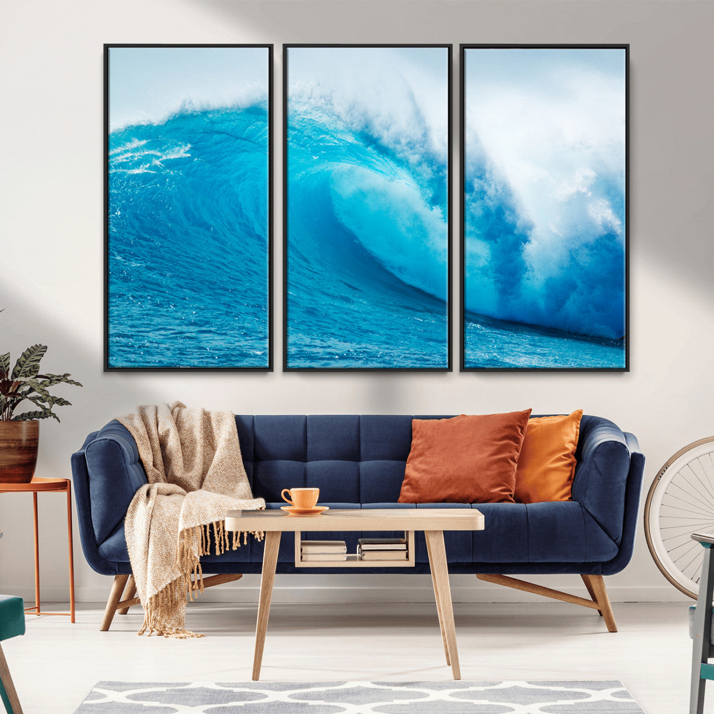 Vibrant canvas of a powerful curling ocean wave in tropical blue tones, perfect for coastal or surf-inspired decor settings.