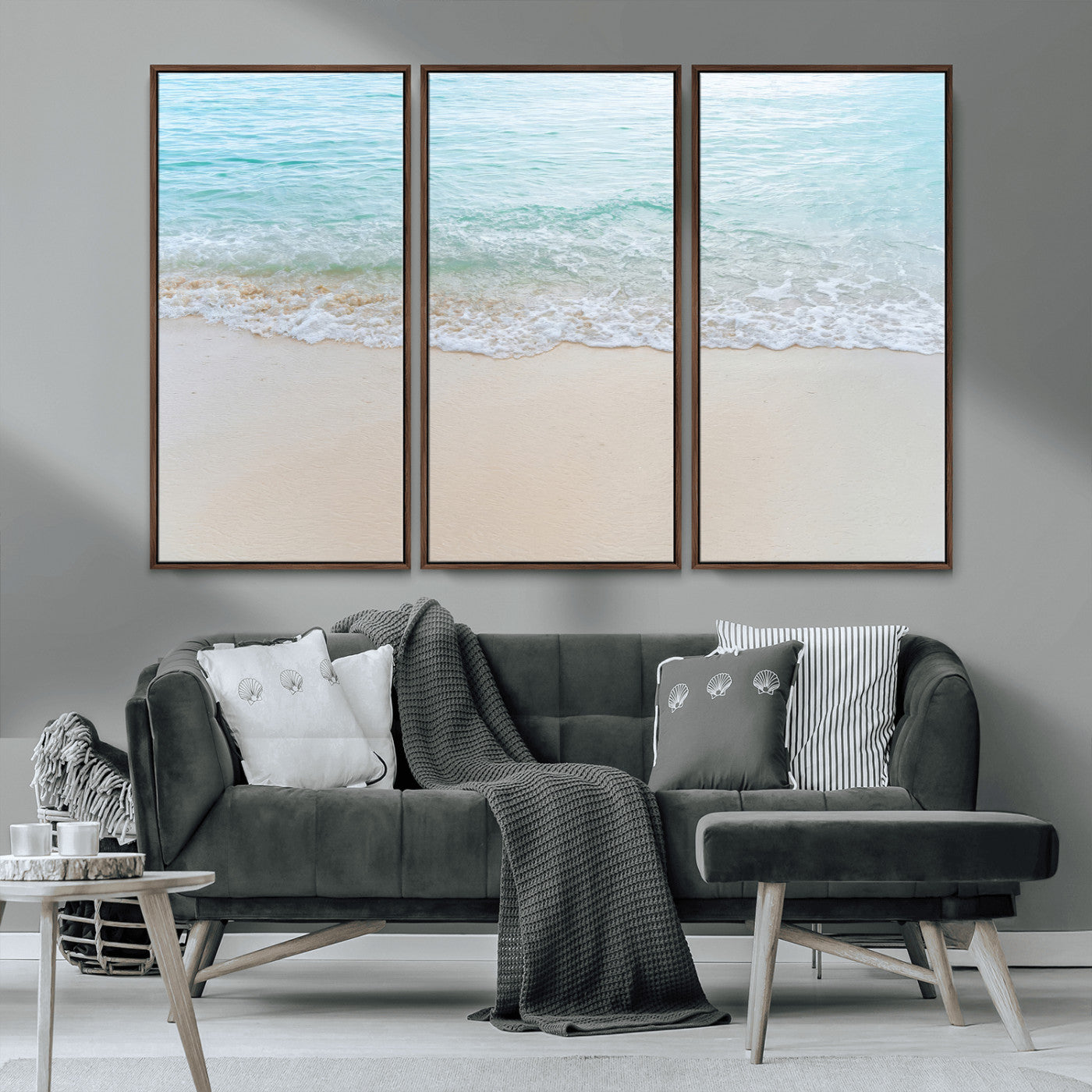 Soft shoreline with gentle aqua waves on smooth sand, ideal for minimalist coastal or pastel ocean-inspired home wall decor.