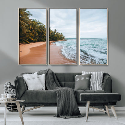 Framed canvas of a tropical beach with palm trees and soft waves, ideal for coastal escape or serene nature-inspired home decor.