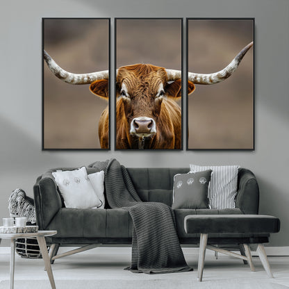 Close-up of a Texas Longhorn with strong curved horns and warm brown tones, perfect for rustic or western-style wall decor.