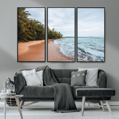 Framed canvas of a tropical beach with palm trees and soft waves, ideal for coastal escape or serene nature-inspired home decor.