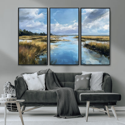 A beautiful, painterly landscape of a calm river winding through a marsh, with vibrant green grasses and a bright blue sky filled with fluffy clouds.