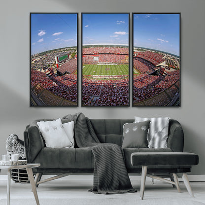 An William Brice-Stadium view of a full football stadium with cheering fans and clear blue skies, capturing the excitement and energy of the game.