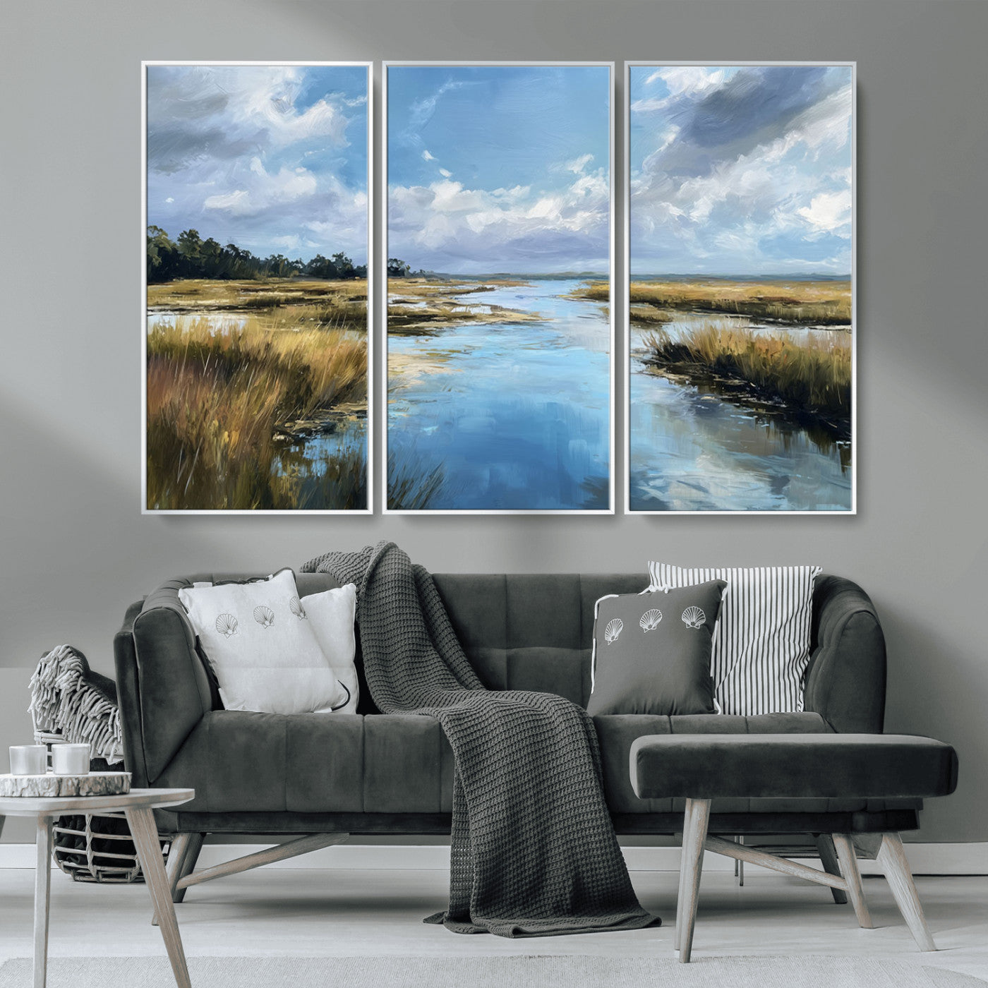 A beautiful, painterly landscape of a calm river winding through a marsh, with vibrant green grasses and a bright blue sky filled with fluffy clouds.