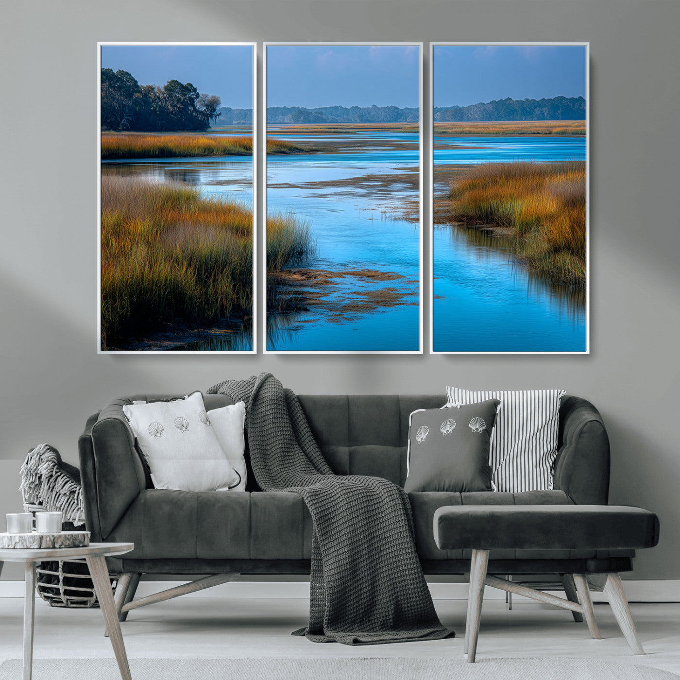 A peaceful marshland scene with calm blue water reflecting the surrounding grasses and trees, capturing the beauty of nature in a serene landscape.