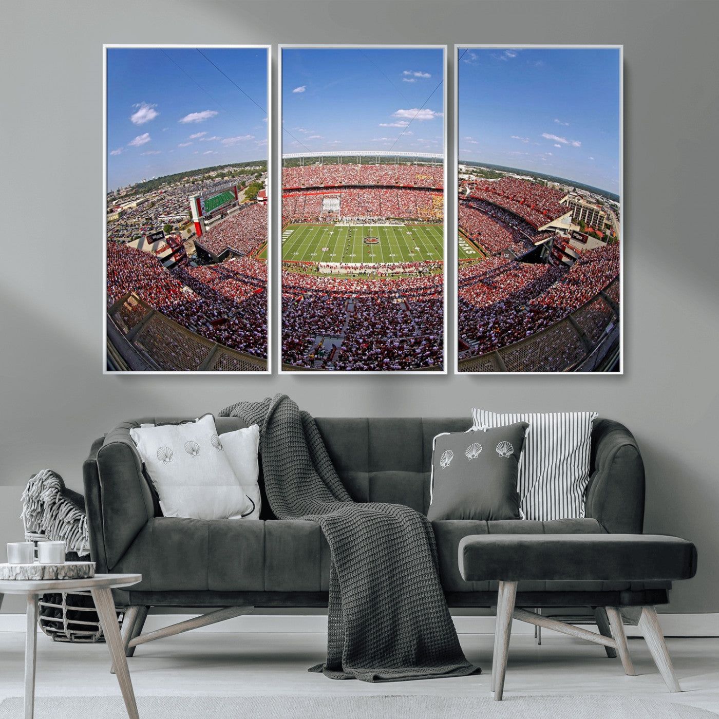 An William Brice-Stadium view of a full football stadium with cheering fans and clear blue skies, capturing the excitement and energy of the game.
