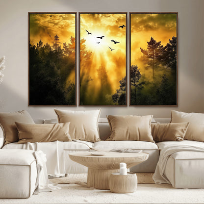 Canvas of a golden forest at sunset with birds flying through glowing sunbeams and silhouetted pine trees, ideal for warm-toned rustic decor.