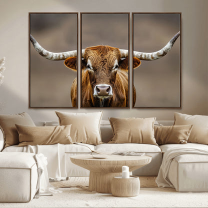 Close-up of a Texas Longhorn with strong curved horns and warm brown tones, perfect for rustic or western-style wall decor.