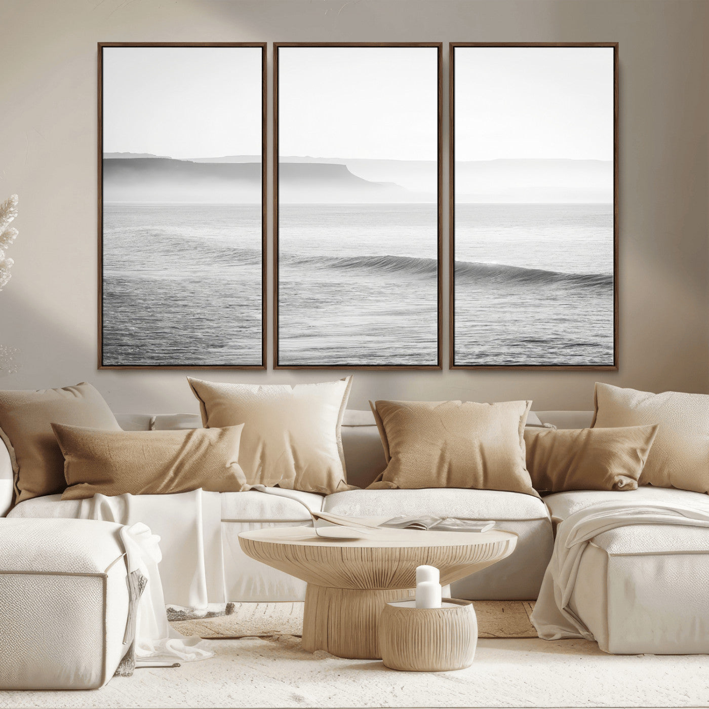 A black and white minimalist seascape featuring soft rolling waves and misty distant cliffs, creating a serene and timeless coastal atmosphere.