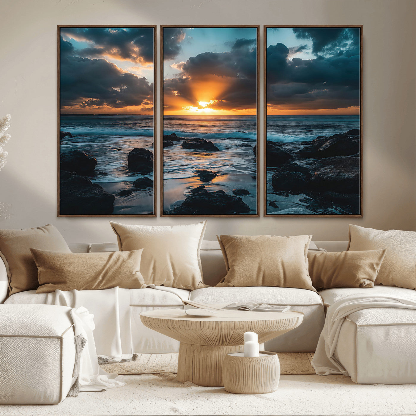 An awe-inspiring sunset over the ocean with rays of light piercing through dramatic clouds, creating a beautiful seascape with rocks in the foreground.