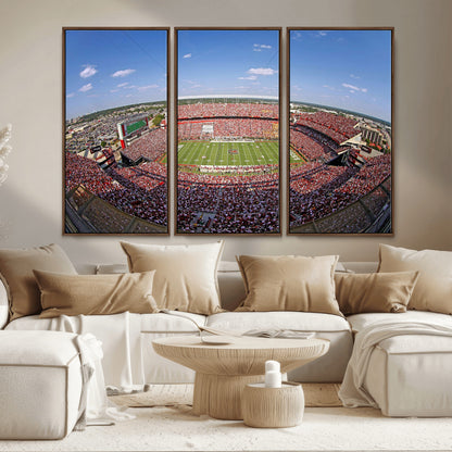 An William Brice-Stadium view of a full football stadium with cheering fans and clear blue skies, capturing the excitement and energy of the game.