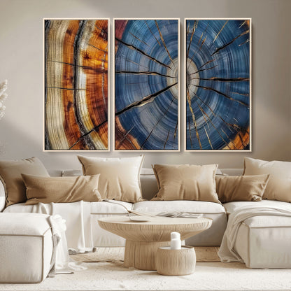 A stunning close-up view of a tree trunk, showcasing the intricate growth rings in a vibrant mix of warm browns, cool blues, and hints of natural texture.