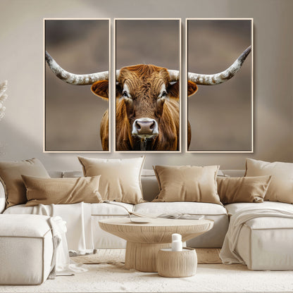 Close-up of a Texas Longhorn with strong curved horns and warm brown tones, perfect for rustic or western-style wall decor.