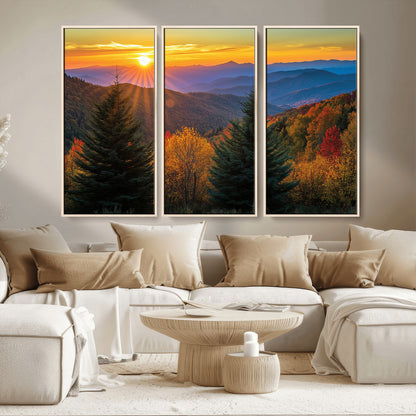 Vibrant sunset over autumn mountains with colorful trees and warm light, ideal for nature lovers or cabin-style wall decor.