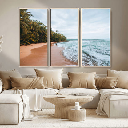 Framed canvas of a tropical beach with palm trees and soft waves, ideal for coastal escape or serene nature-inspired home decor.
