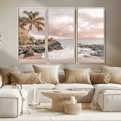 A peaceful beach scene with a palm tree and rocks, soft waves washing onto the shore under a soft pastel sky at sunset.