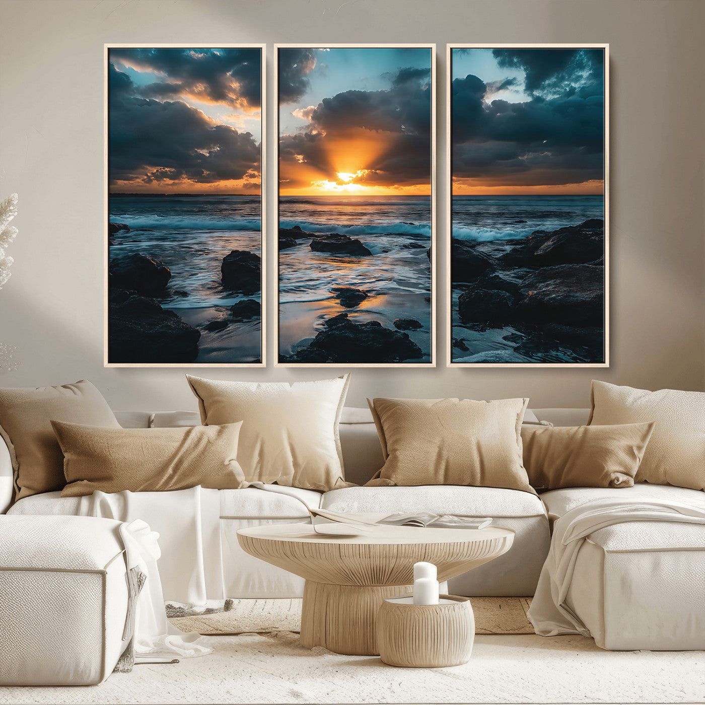 An awe-inspiring sunset over the ocean with rays of light piercing through dramatic clouds, creating a beautiful seascape with rocks in the foreground.