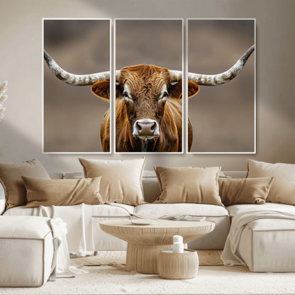 Close-up of a Texas Longhorn with strong curved horns and warm brown tones, perfect for rustic or western-style wall decor.