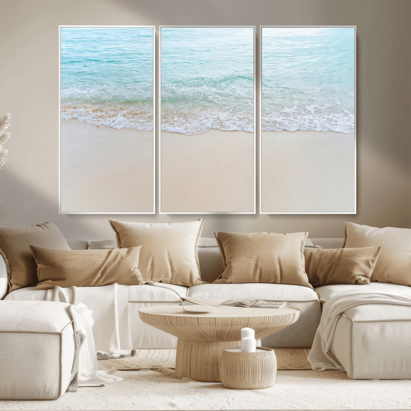 Soft shoreline with gentle aqua waves on smooth sand, ideal for minimalist coastal or pastel ocean-inspired home wall decor.