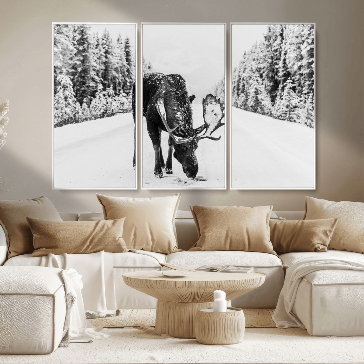 A majestic moose grazing in the snow-covered wilderness, surrounded by snow-covered trees, creating a peaceful winter scene.