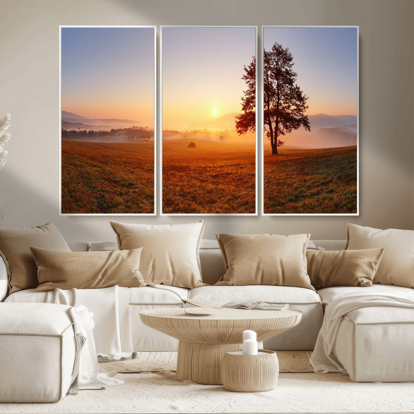 A tranquil landscape at sunrise with a mist-covered field and a lone tree, creating a peaceful and natural atmosphere.