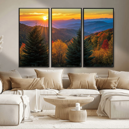 Vibrant sunset over autumn mountains with colorful trees and warm light, ideal for nature lovers or cabin-style wall decor.