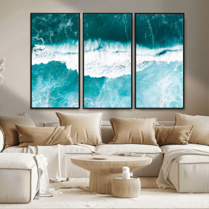 Aerial view of turquoise ocean waves crashing with white foam, perfect for tropical coastal or modern beach-style home decor.
