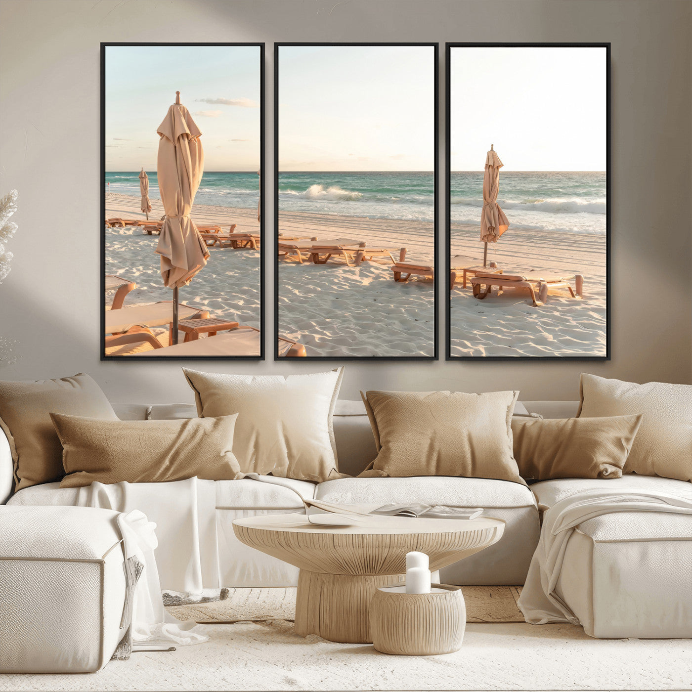Minimalist photo of empty beach loungers and umbrellas on soft sand, ideal for calm seaside or pastel coastal-style home decor.