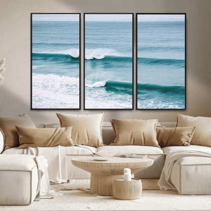 Powerful ocean waves rolling towards the shore, their turquoise hues blending with white sea foam under an open horizon, capturing the essence of the ocean's movement.
