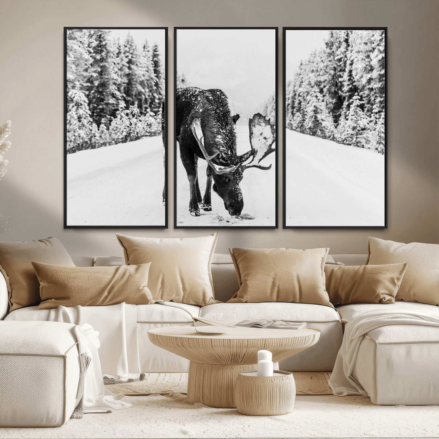 A majestic moose grazing in the snow-covered wilderness, surrounded by snow-covered trees, creating a peaceful winter scene.