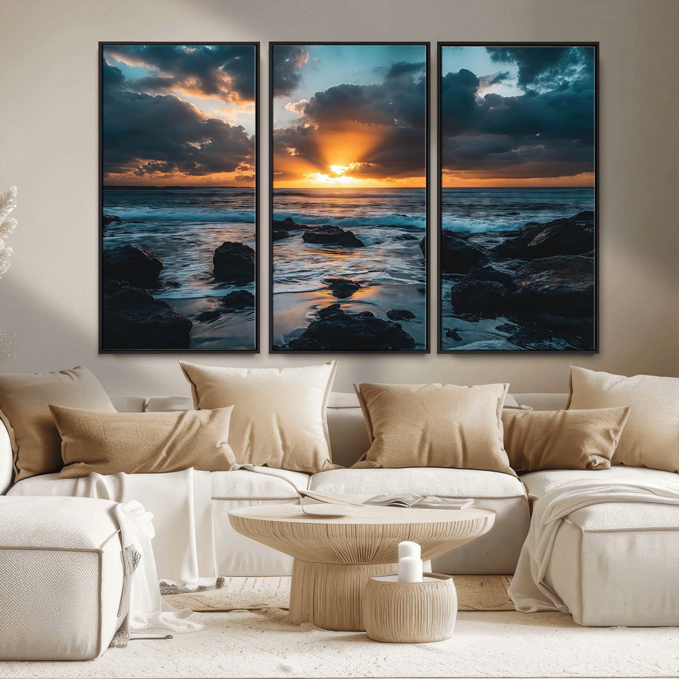 An awe-inspiring sunset over the ocean with rays of light piercing through dramatic clouds, creating a beautiful seascape with rocks in the foreground.