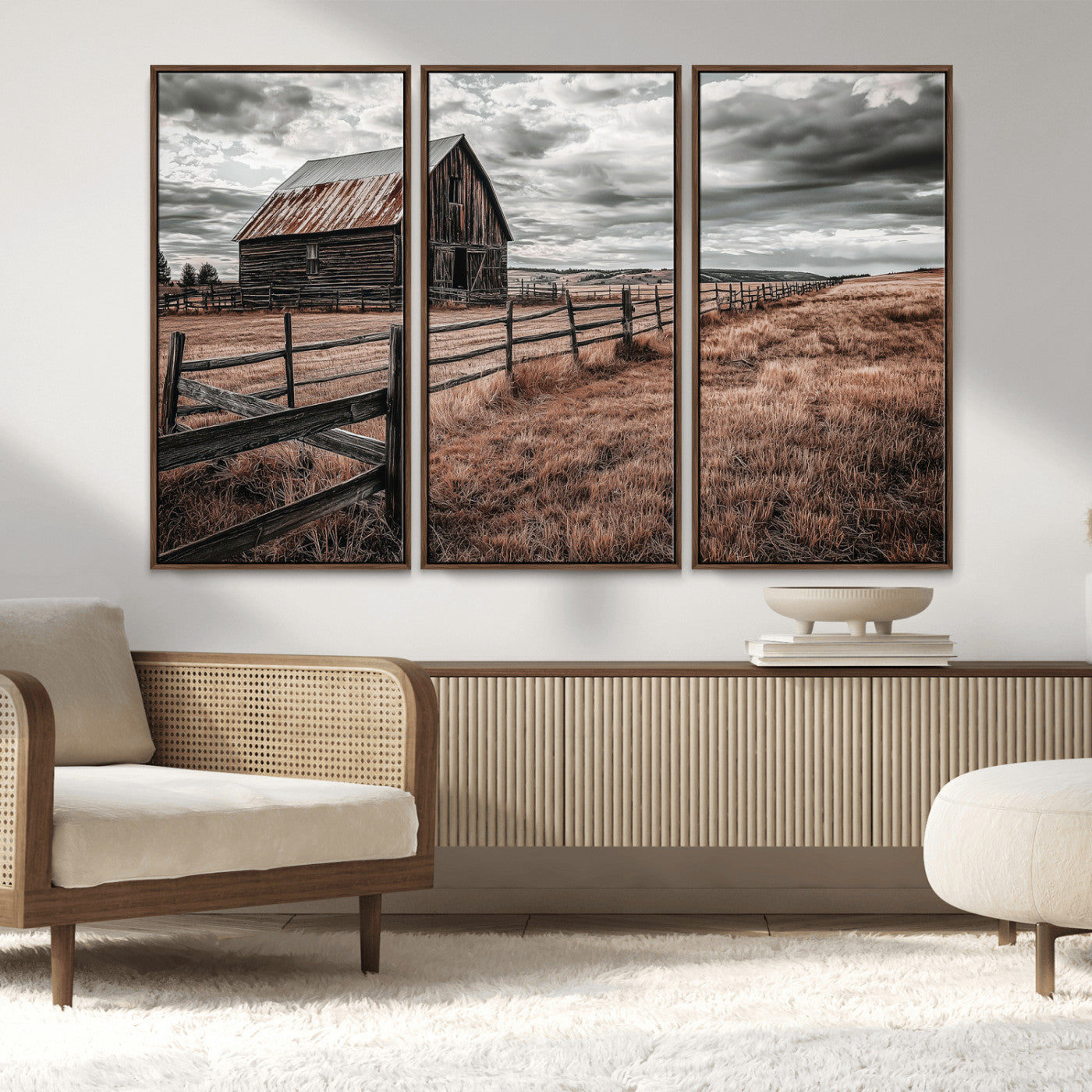 Framed canvas of a rustic barn under a moody sky with weathered fence and dark fields, ideal for farmhouse or rural-style wall decor.