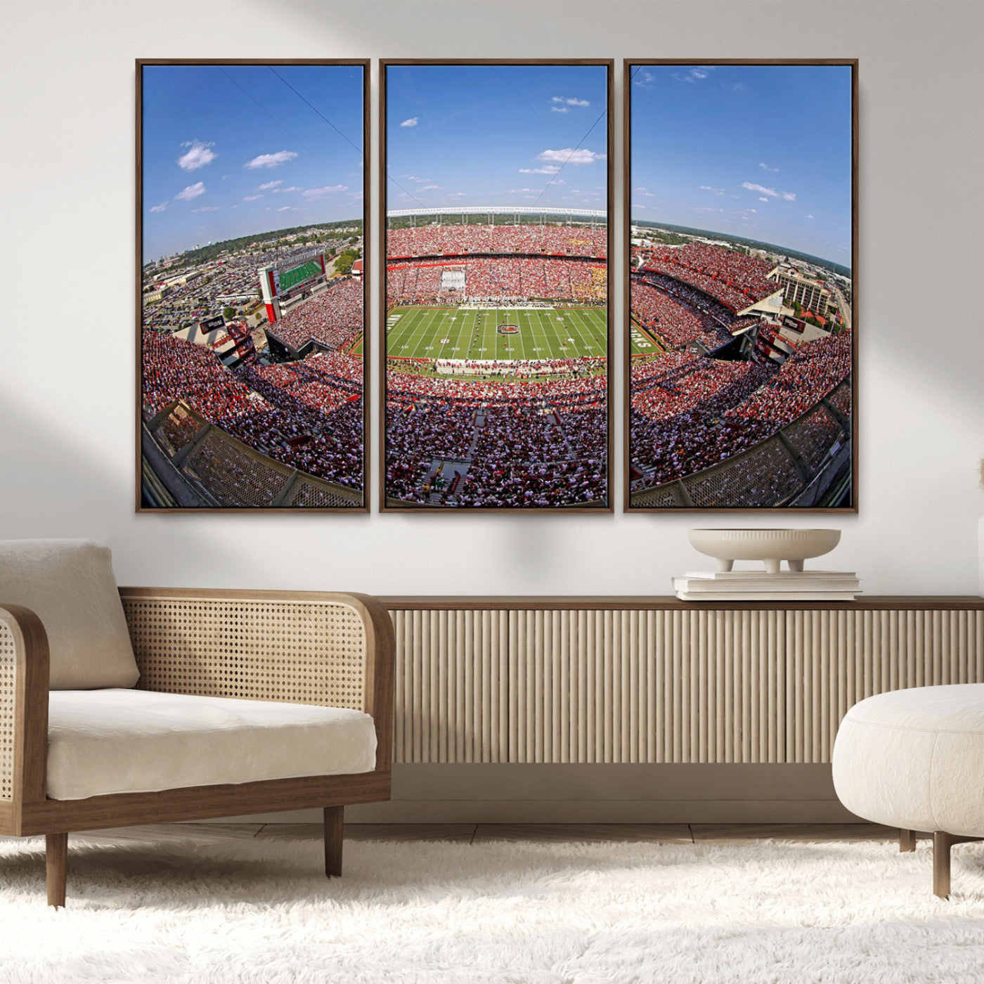 An William Brice-Stadium view of a full football stadium with cheering fans and clear blue skies, capturing the excitement and energy of the game.