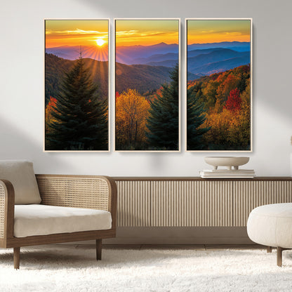 Vibrant sunset over autumn mountains with colorful trees and warm light, ideal for nature lovers or cabin-style wall decor.