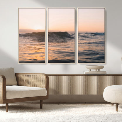 Framed canvas of ocean waves glowing in sunset light, ideal for golden hour calm or peaceful coastal-inspired wall decor.