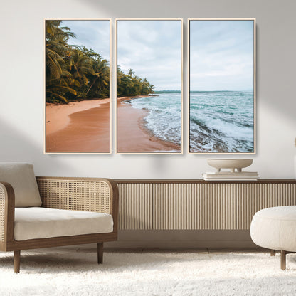 Framed canvas of a tropical beach with palm trees and soft waves, ideal for coastal escape or serene nature-inspired home decor.