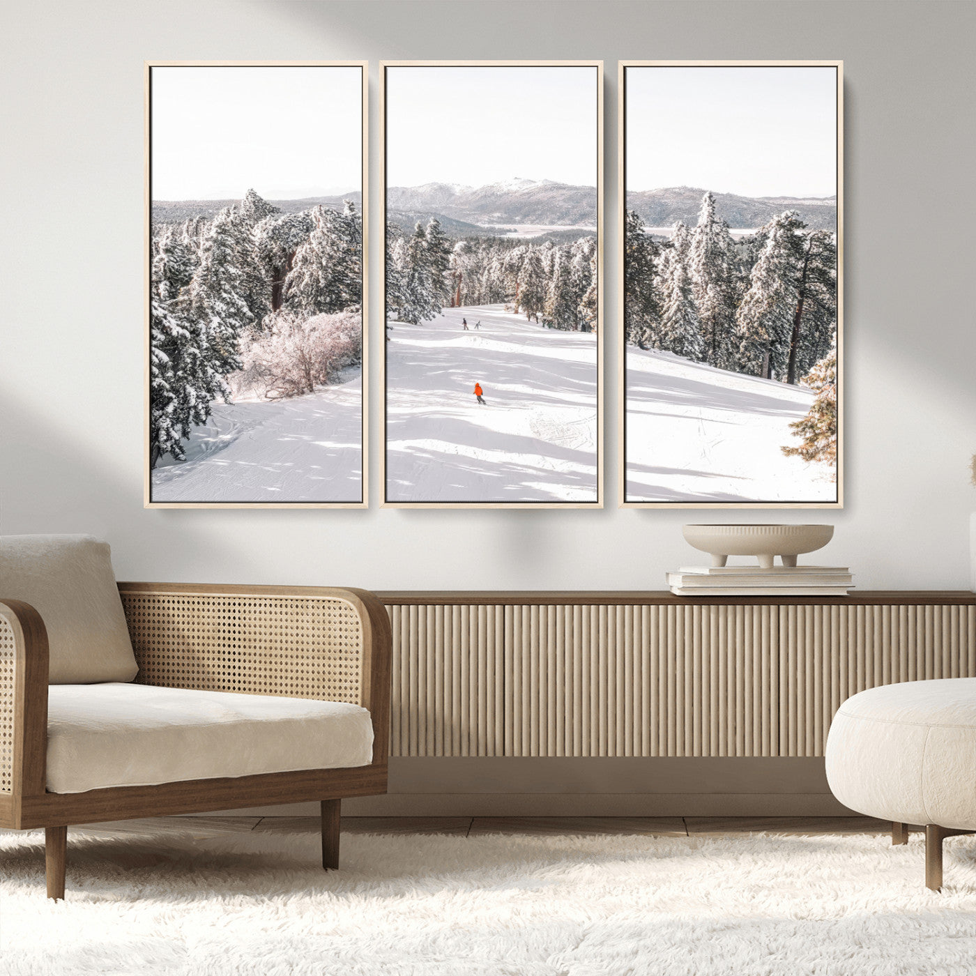 Bright ski trail lined with snow-covered pines and a skier in orange, perfect for alpine adventure or winter sports-inspired decor.
