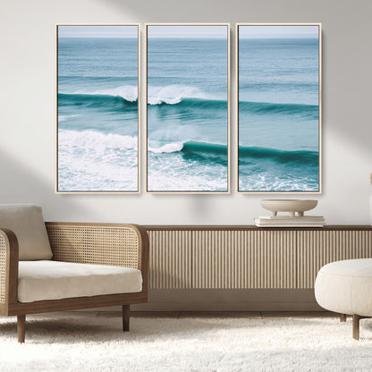 Powerful ocean waves rolling towards the shore, their turquoise hues blending with white sea foam under an open horizon, capturing the essence of the ocean's movement.