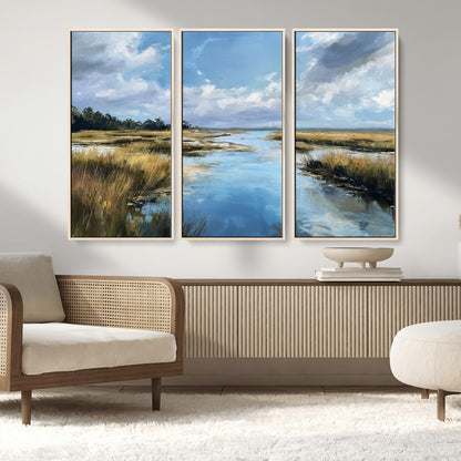 A beautiful, painterly landscape of a calm river winding through a marsh, with vibrant green grasses and a bright blue sky filled with fluffy clouds.