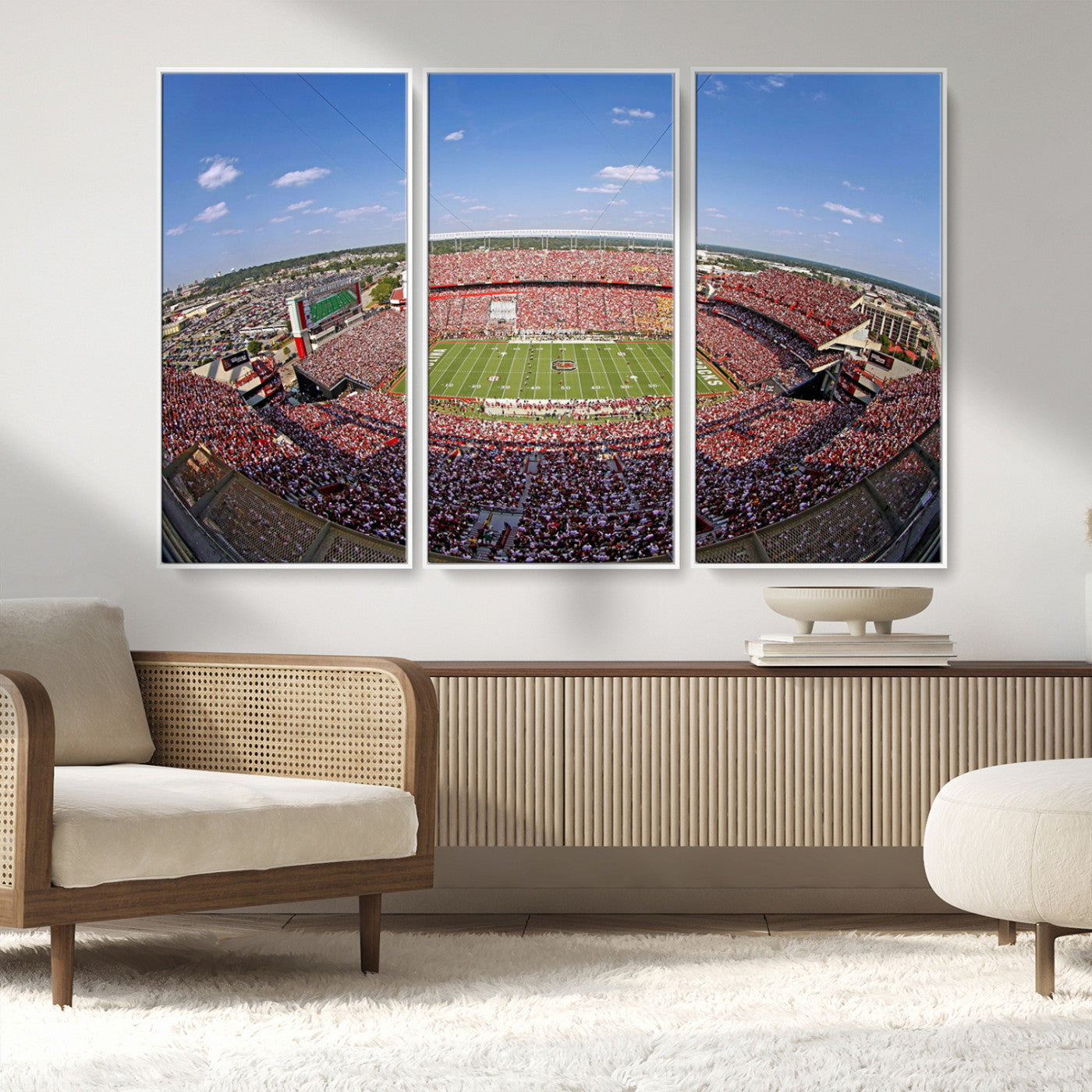 An William Brice-Stadium view of a full football stadium with cheering fans and clear blue skies, capturing the excitement and energy of the game.