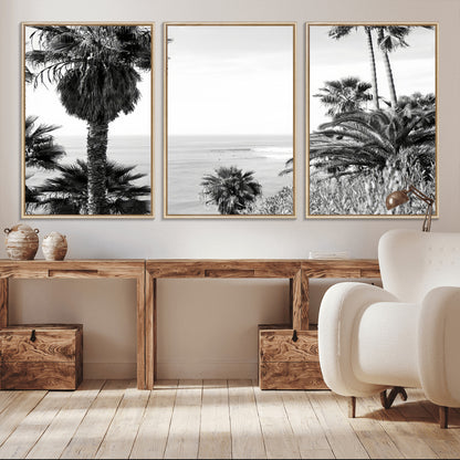 Monochrome canvas of palm trees framing a coastal surf scene, perfect for California-inspired or retro black-and-white beach decor.