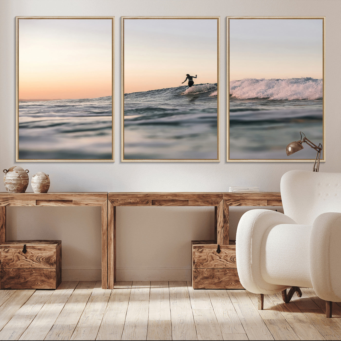Framed canvas of a female surfer balancing on a wave at sunset, perfect for serene surf or ocean-inspired coastal decor.